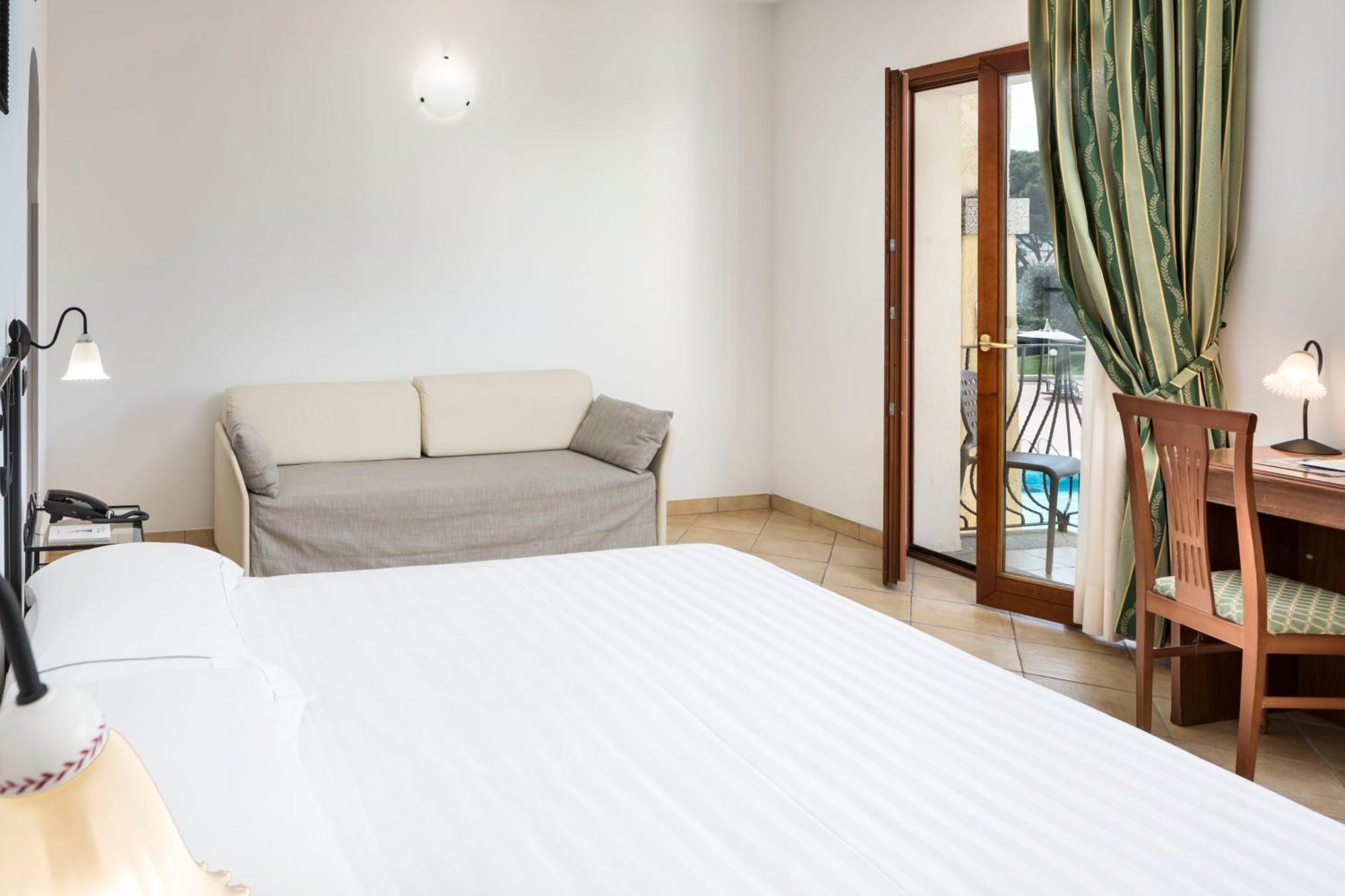 Blu Hotel Morisco Cannigione Pokoj fotografie